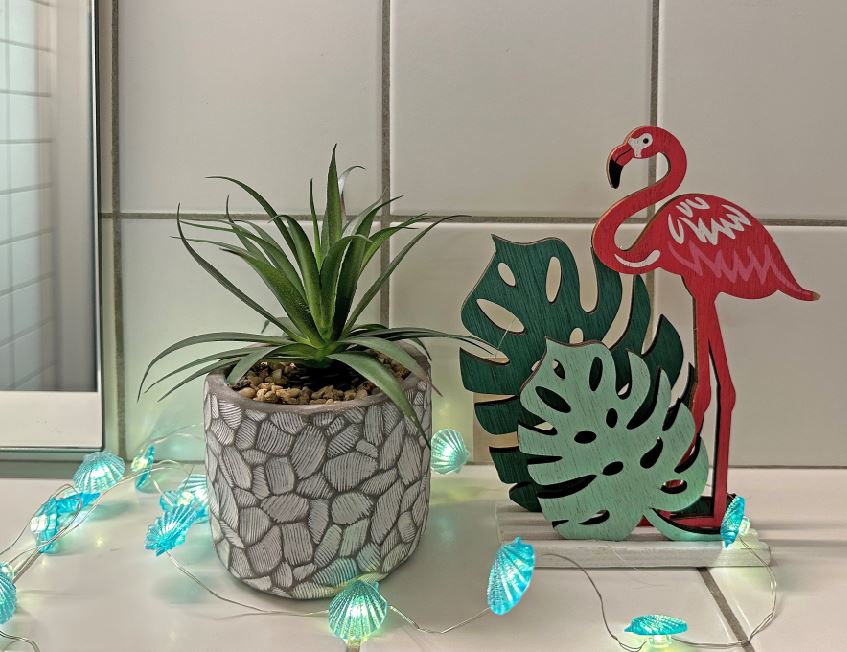 Dekosteller Flamingo aus Holz
mit Blätter L:12cm B:4cm H:20cm