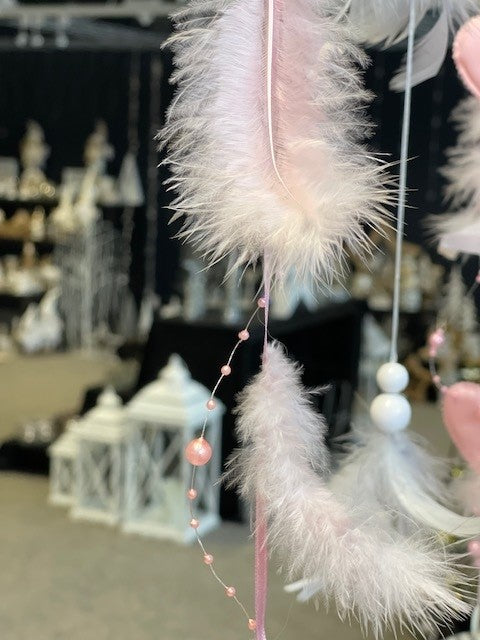 Girlande mit 10 Federn und
Perlenkette Länge 125cm
Farbe: rosa