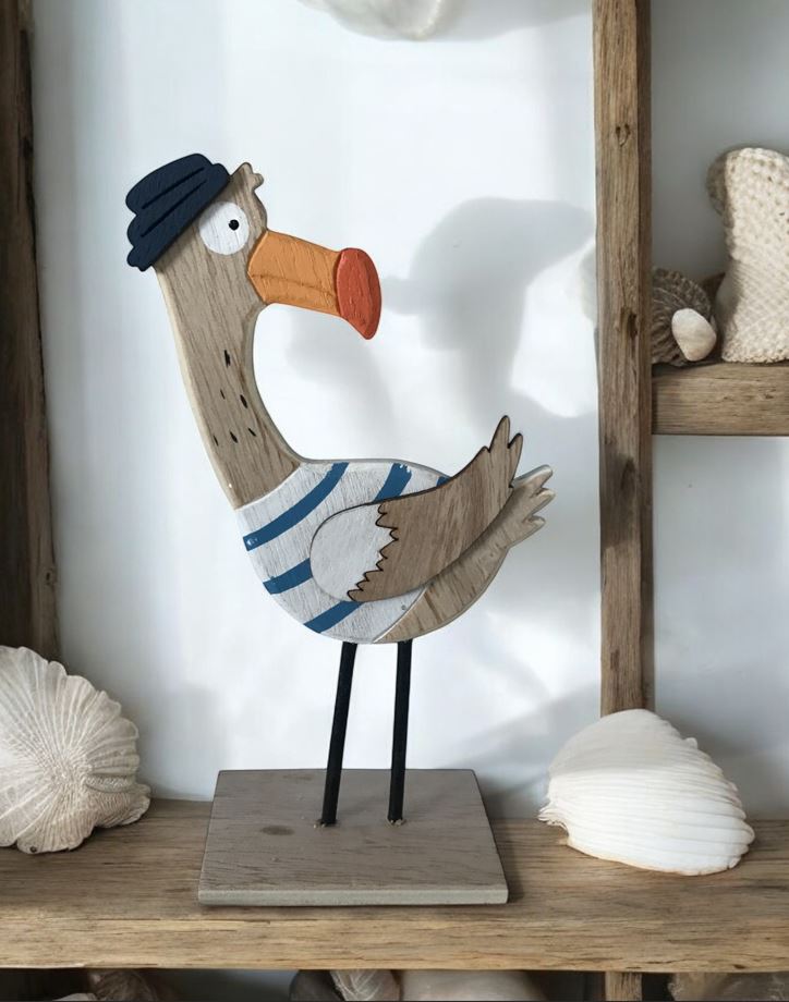 Deko Möwe
Matrose aus Holz
Farbe: Weiss/Blau
L:10cm B:5cm H:18.5cm