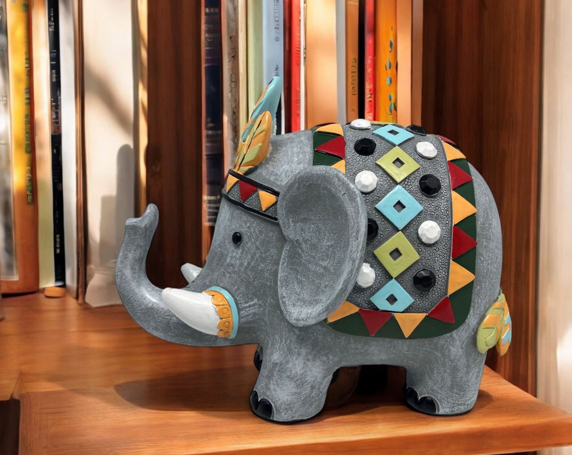 Deko Elefant
grau mit buntem Sattel und Kopfschmuck
11.5 x19.5 x15.5cm