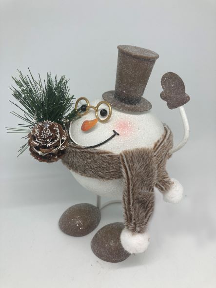 Figurine décorative bonhomme de neige
fait de metal
L11 cm x l 14 cm x H18 cm