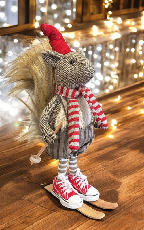 Deko Eichhörnchen auf Ski braun weiss mit roter Mütze