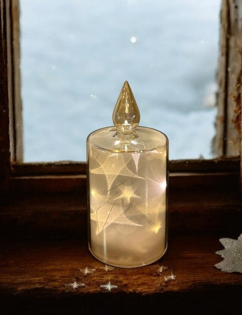 LED Glas Deko Kerze transparent gold mit 12 LED Sternenmotive 3D