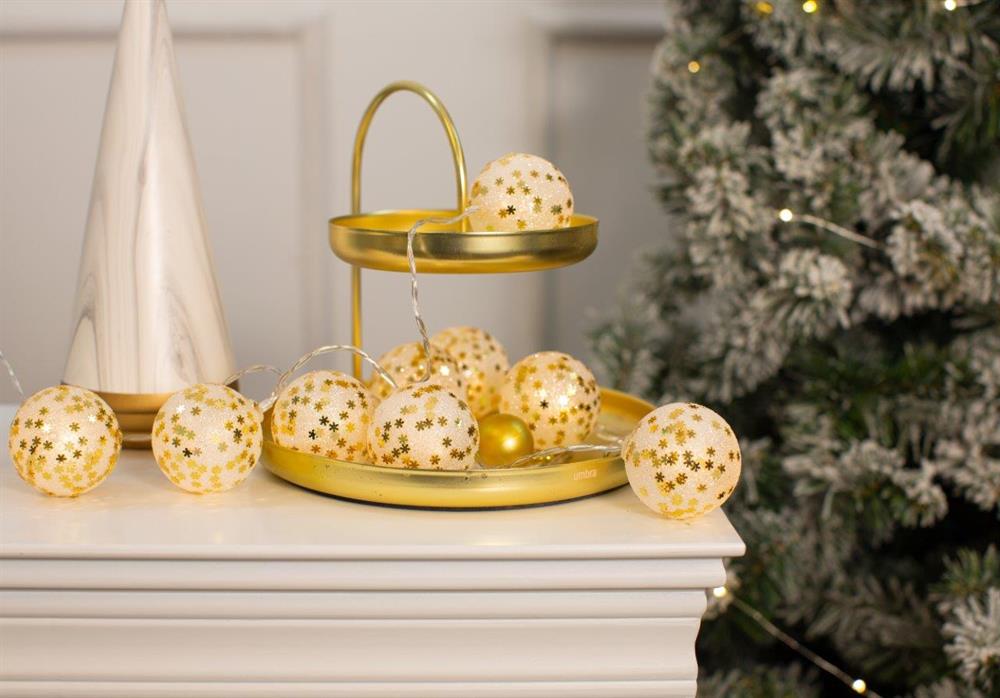Catena luminosa a LED con 10 LED
Glitter su palline bianche con
fiocchi di neve dorati