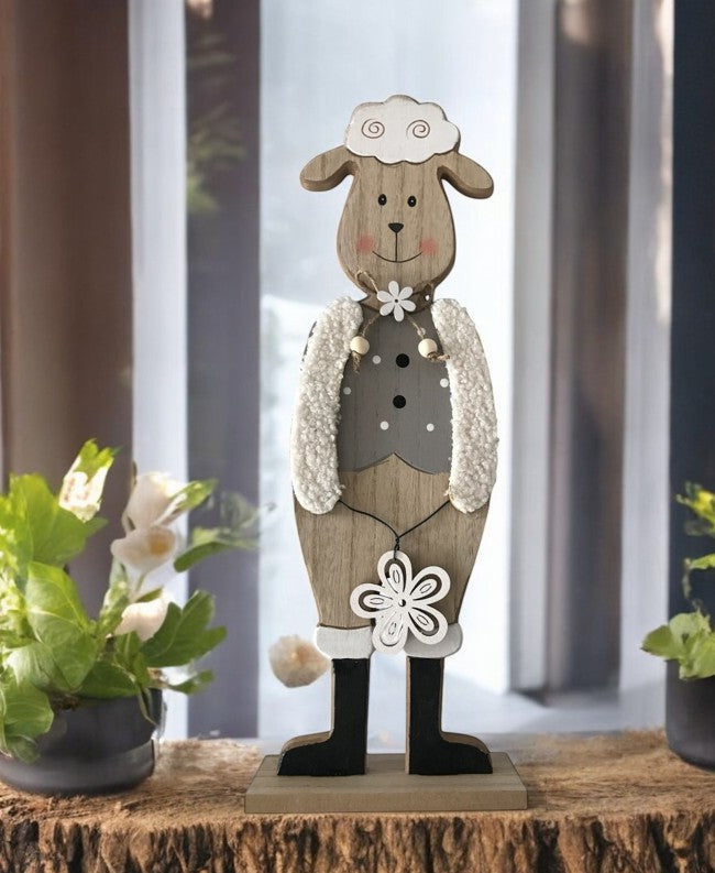 Deko Schaf aus Holz auf Sockel
Farbe: Grau weiss
L:14cm B:5cm H:39cm
