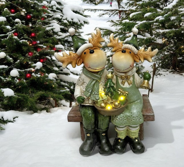 LED Deko Rentier sitzend auf der Bank 3 warm weisse LED