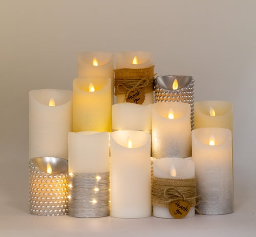 Candela di cera LED crema/argento
P: 8 cm A: 15 cm