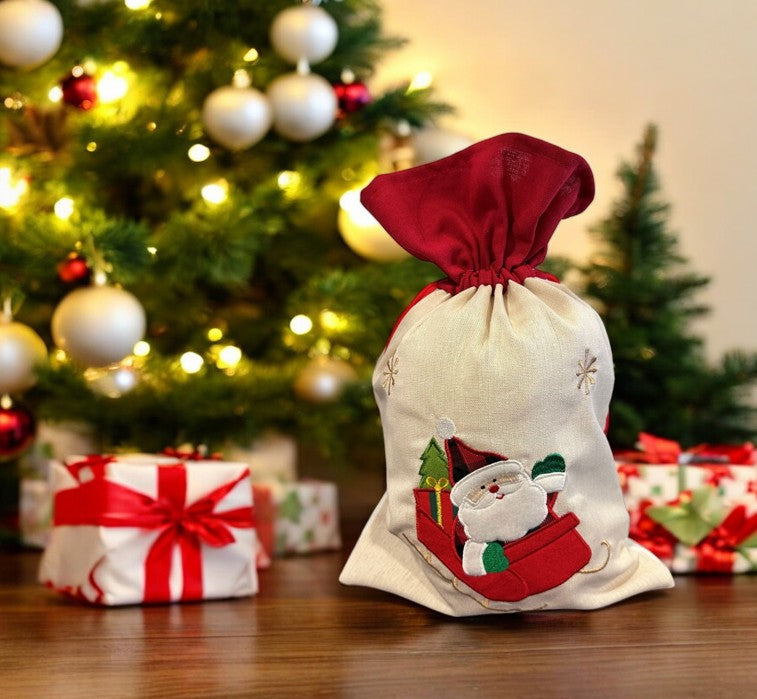Jutesack mit rotem Zugband Santa im Schlitten Grösse: B:25cm H:35cm