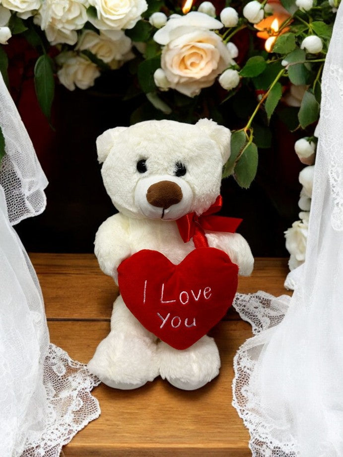 Plüschbär sitzend weiss mit rotem Herzkissen I love you Grösse 22x16x20cm