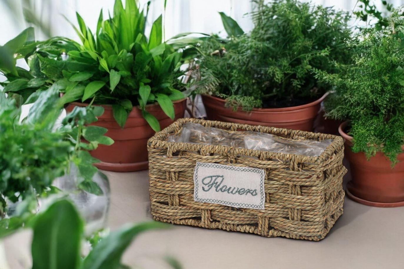 Pflanzkorb rechteckig
aus Seegras Geflecht
mit Metallrahmen