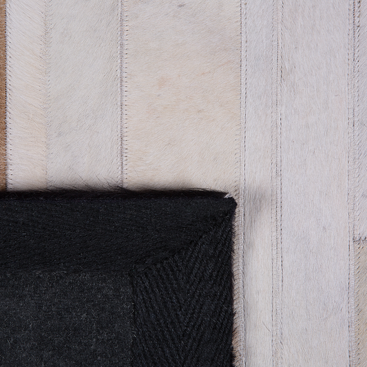 Teppich Kuhfell schwarz-beige 140 x 200 cm Patchwork Kurzflor DALYAN