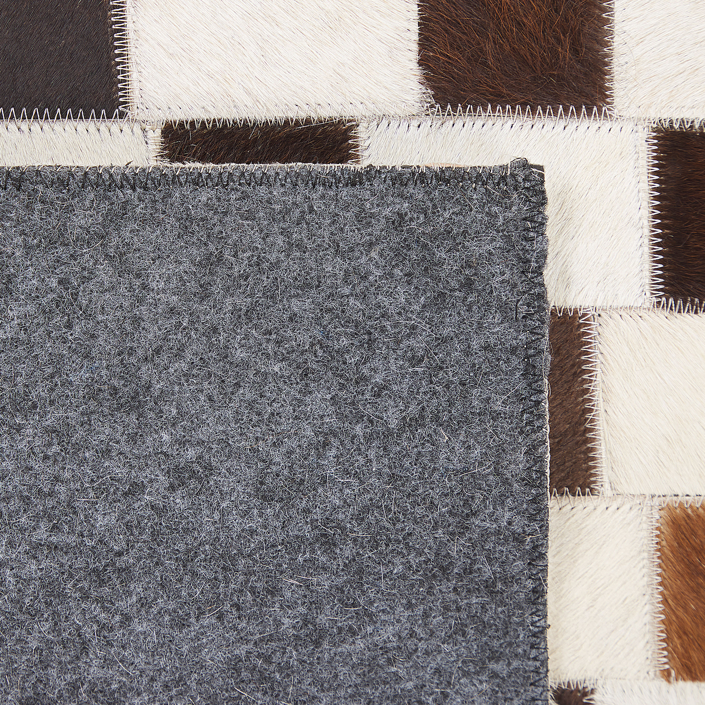 Teppich Kuhfell beige / braun 140 x 200 cm Patchwork Kurzflor KAYABEY