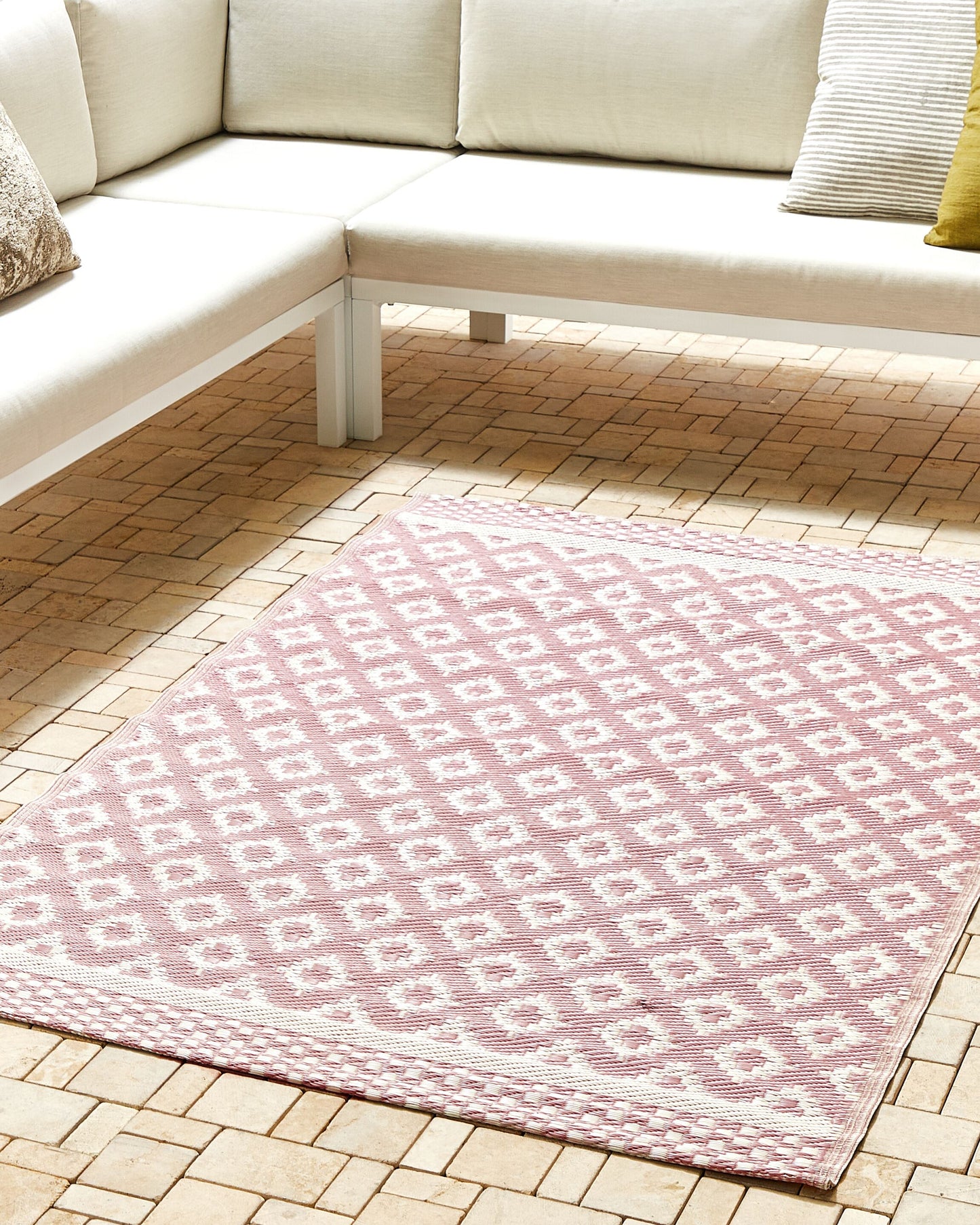 Outdoor Teppich rosa 120 x 180 cm geometrisches Muster THANE