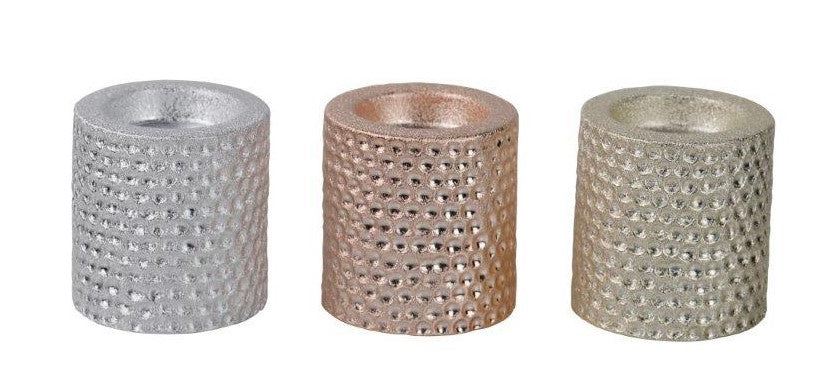 Teelichthalter aus Keramik
Design: gehämmertes Gold
D:7cm x H:7cm