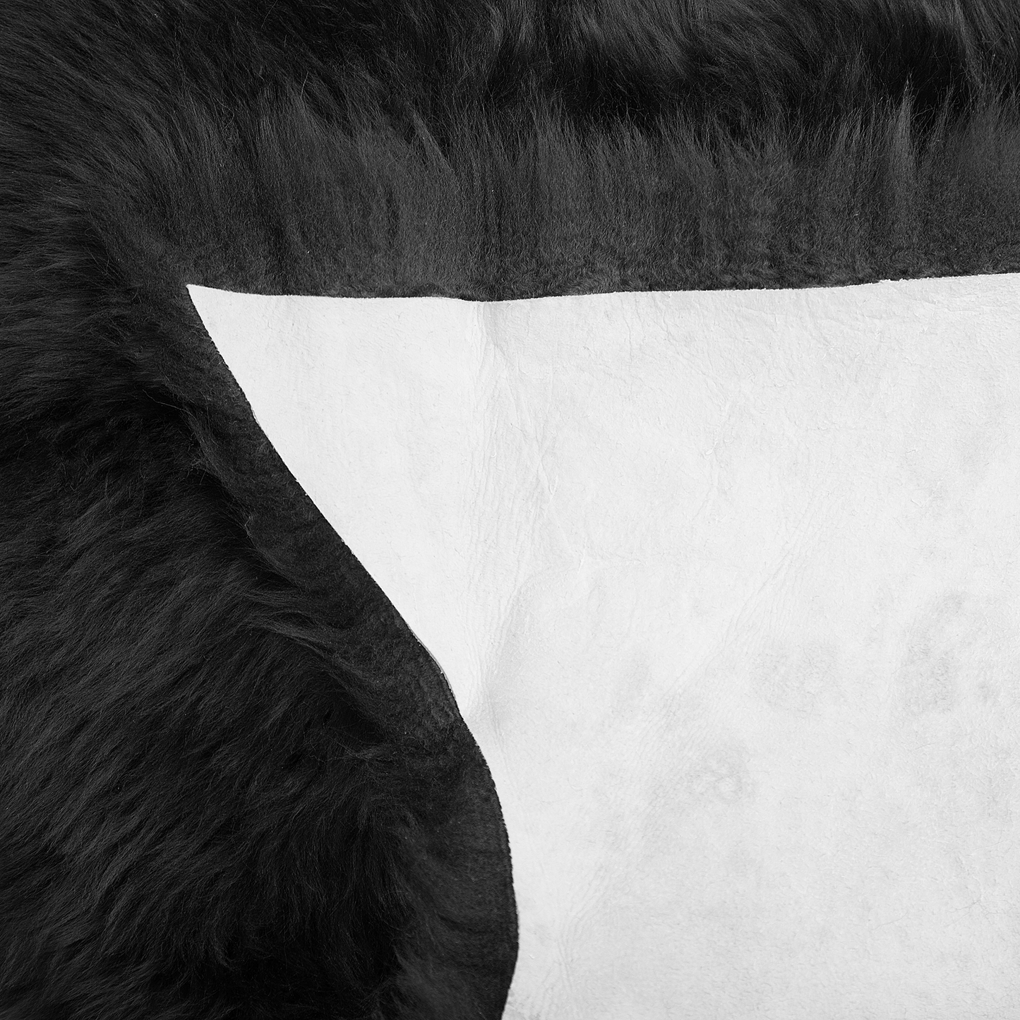 Schaffell-Teppich schwarz 100-110 cm Langhaar ULURU