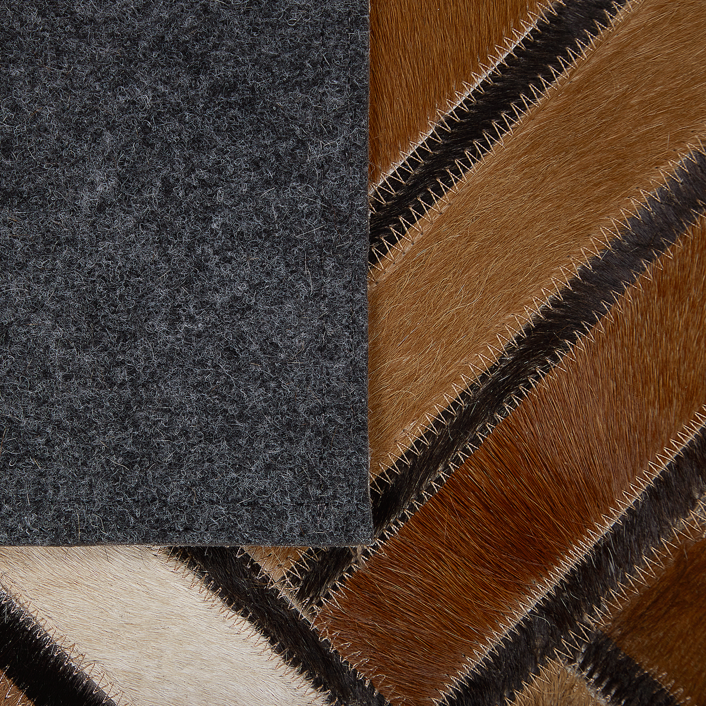 Teppich Kuhfell braun 160 x 230 cm geometrisches Muster Kurzflor TEKIR