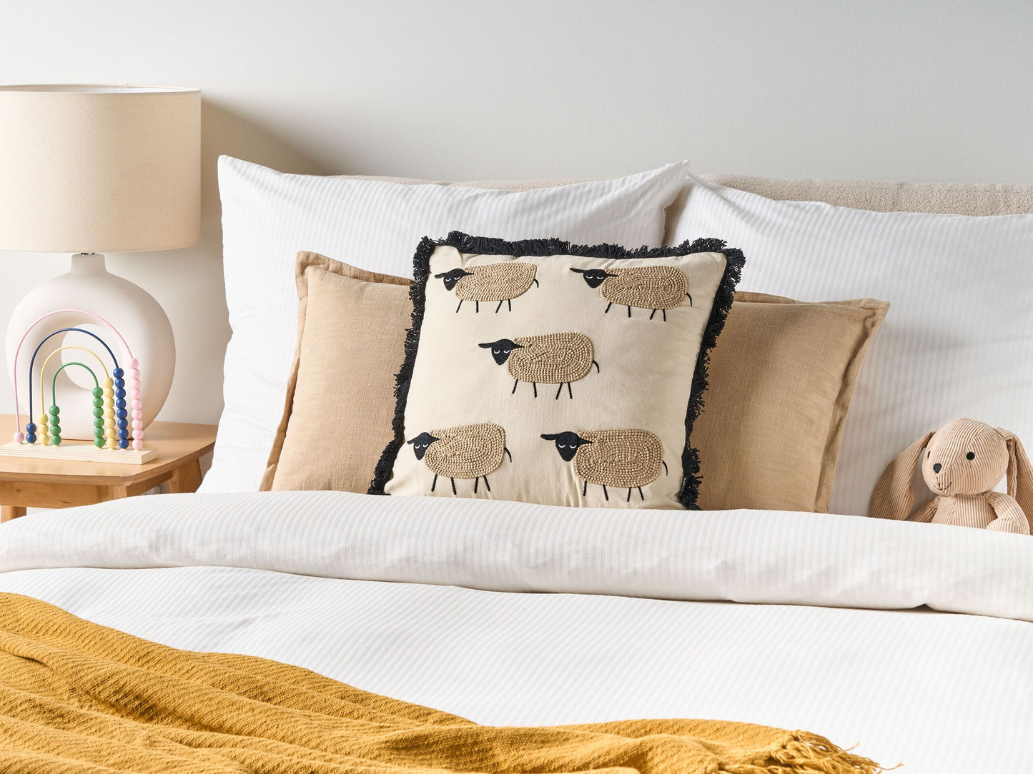 Dekokissen Tiermotiv Baumwolle beige bestickt mit Fransen 45 x 45 cm BANNU