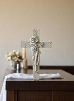 Kreuz aus Polyresin H10.5cm grau verziert mit Blume
