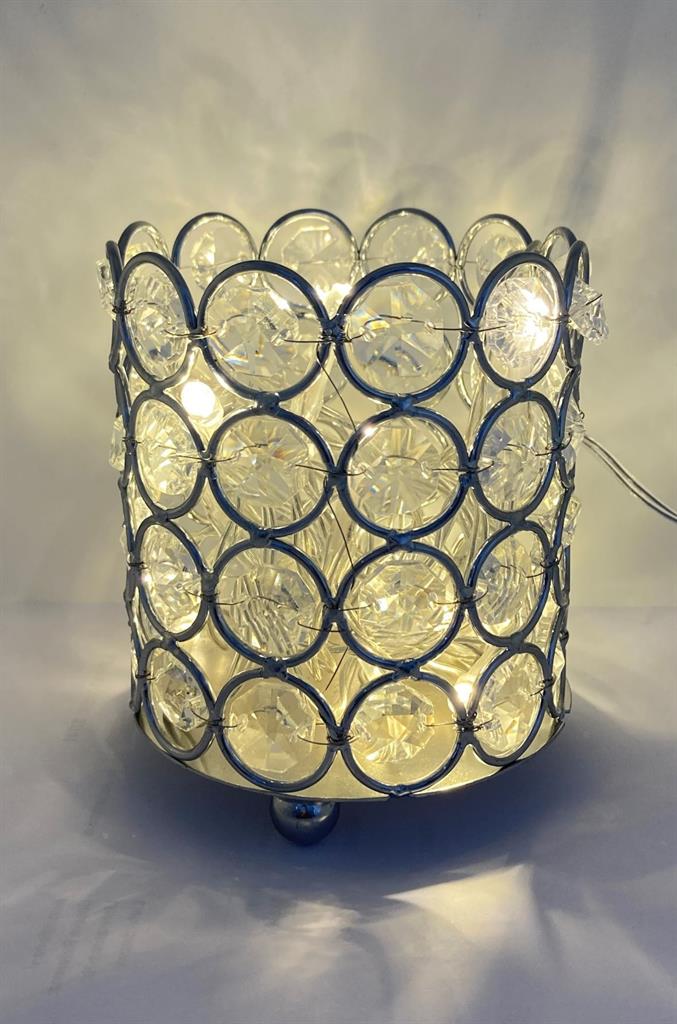 Kerzenhalter mit Strasssteinen 
und verchromtem Metallrahmen
D8.5cm H10cm