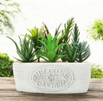 Kunstblume Sukkulenten im Beton Topf  "Welcome" 
H: 16cm B: 20cm T: 11cm