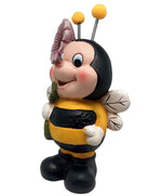 Deko Biene 
mit Blume im Arm 
8 x13 x 20cm
