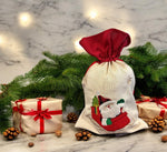 Jutesack mit rotem Zugband Santa im Schlitten Grösse: B:25cm H:35cm