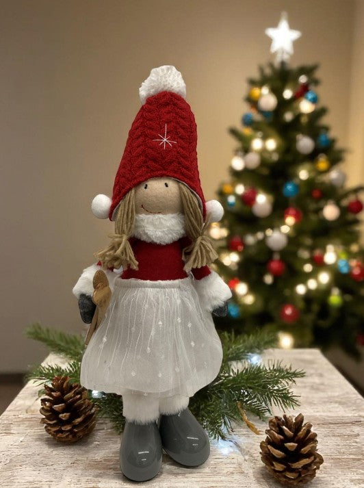 Deko Figur Mädchen stehend 
mit Ski in der Hand H49cm