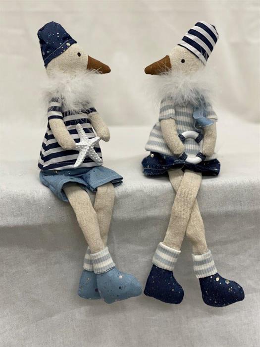 Deko Möwe aus Stoff 
Kantenhocker H:30cm
Design: Beach
Farbe: Blau
L:8cm B:6cm H:30cm