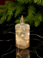 LED Glas Deko Kerze transparent gold mit 12 LED Sternenmotive 3D