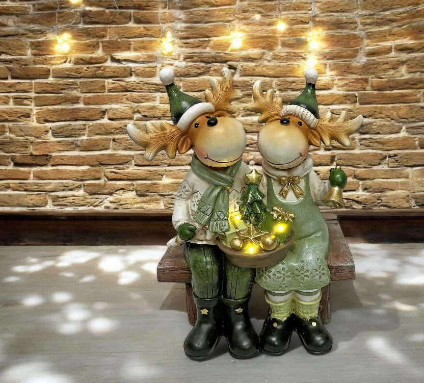 LED Deko Rentier sitzend auf der Bank 3 warm weisse LED