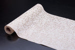 Dekostoff "Vlies" gerollt und geschnitten
36cm x 300cm 
Farbe: Weiss mit Muster