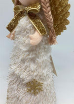 Deko Engel stehend weiss 
Grösse: 8x7x21cm
mit brauner Strickmütze