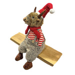 Deko Hochlandrind sitzend mit Santa Mütze 20x23x75cm