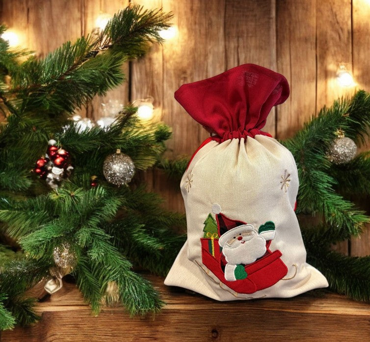 Jutesack mit rotem Zugband Santa im Schlitten Grösse: B:25cm H:35cm