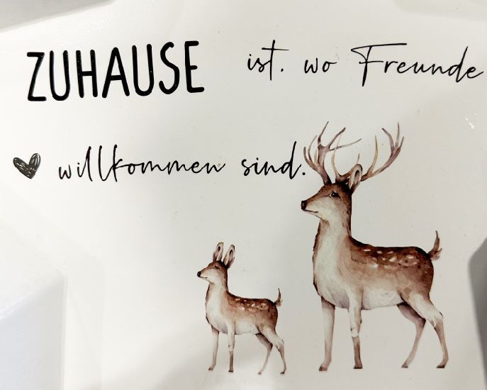 Tablett als Stern aus Holz mit Spruch Zuhause ist da, wo Freunde willkommen sind