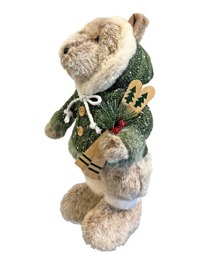 Deko Bär stehend grün mit Kapuze und Ski in der Hand