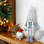 Deko Wichtel Santa Mädchen 
stehend Farbe: Weiss / Grau 
L6cm x B17cm x H66cm