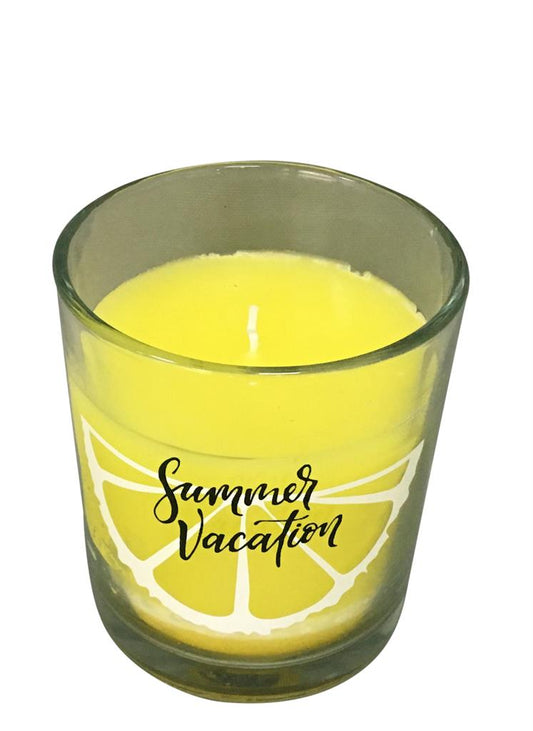 Bougie parfumée dans un verre à la cire jaune