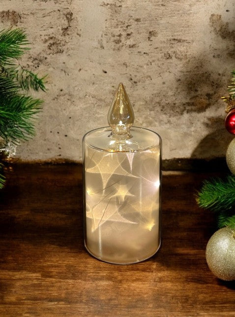 LED Glas Deko Kerze transparent gold mit 12 LED Sternenmotive 3D