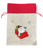 Jutesack mit rotem Zugband Santa im Schlitten Grösse: B:25cm H:35cm