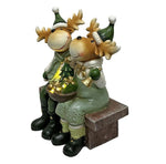 LED Deko Rentier sitzend auf der Bank 3 warm weisse LED