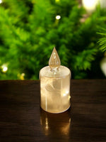 LED Glas Deko als Kerze transparent gold mit 10 LED Sternenmotive 3D