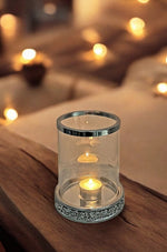 Windlicht aus Glas mit Strasssteinen auf Metallsockel H17cm