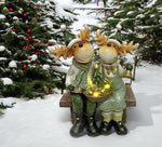 LED Deko Rentier sitzend auf der Bank 3 warm weisse LED