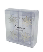 Rond de serviette lot de 4
 Flocons de neige argentés
 Taille 55-60 mm en acier inoxydable