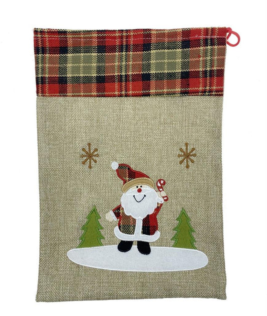 Jutesack mit rotem Zugband 
Design: Santa
Grösse: B:21cm H:30cm