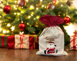 Jutesack mit rotem Zugband Santa Merry Christmas Grösse: B:21cm H:30cm