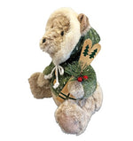 Deko Bär sitzend grün mit Kapuze und Ski in der Hand