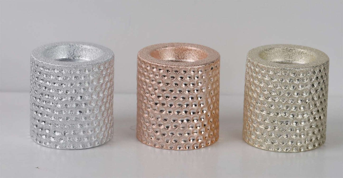 Teelichthalter aus Keramik
Design: gehämmertes Silber
D:7cm x H:7cm