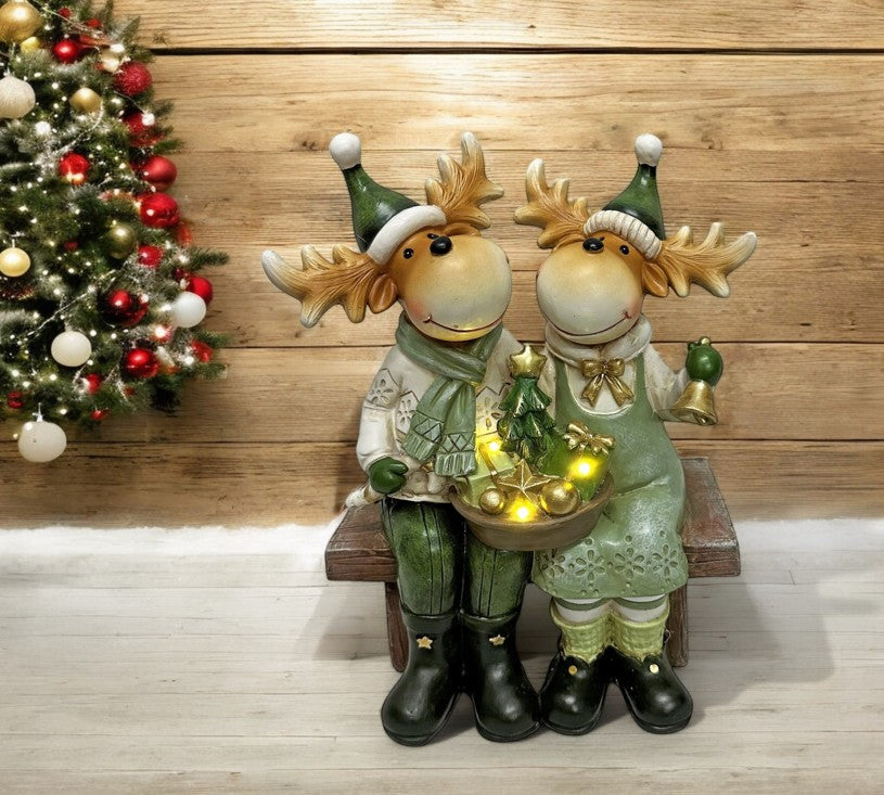 LED Deko Rentier sitzend auf der Bank 3 warm weisse LED